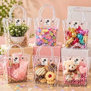 BOLSITAS PVC TRANSPARENTE CON LUNARES BLANCOS Y MANIJAS 16X16X8 CM (PACK X 12 UNIDADES)