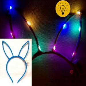 VINCHA OREJAS DE CONEJO CALADA COLOR CELESTE LUMINOSA X 12