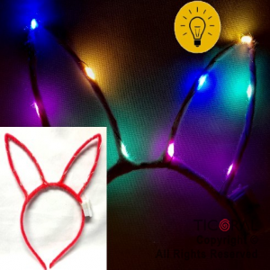 VINCHA OREJAS DE CONEJO CALADA COLOR FUCSIA LUMINOSA X 12