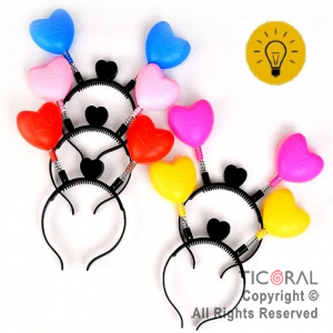 VINCHA LUMINOSA CORAZON CON RESORTE COLORES SURTIDOS X 1