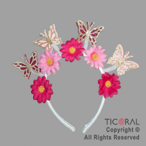 VINCHA FLORES MARGARITAS Y MARIPOSAS ROSA Y FUCSIA x 1